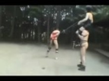 Japanese Cruel Mistress and her slaves outdoors