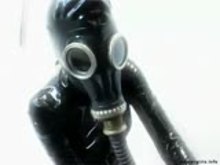 Rubber Slave Girl with Gas Mask