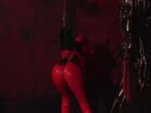 Latex slave in restraints