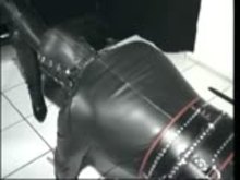 Leather slave with two Mistresses