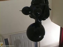 Suspended Rubber girl