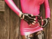 Susan Wayland in Pink Latex Dress