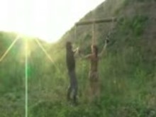 Suspension and crucifixion outdoors