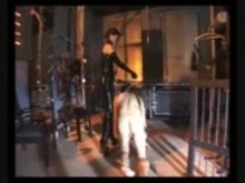 Strict Mistress with Caged Slave