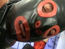 Restrained and Blindfolded Latex Girl