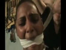 Black Submissive Bound and Gagged