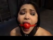 Red Latex Slave in dungeon