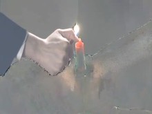 Candle in her Pussy put off with Piss