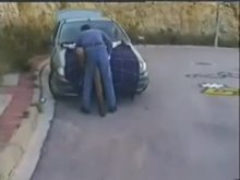 Bondage on car hood Outdoors