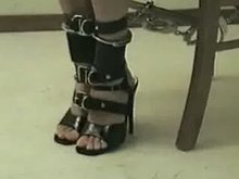 Strapped to chair
