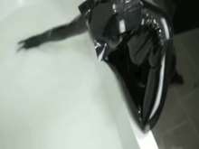 Rubber Pet Girl Taking a Bath