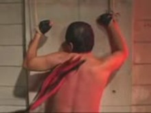Japanese Dominatrix delivers a whipping