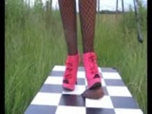 Mature Mistress trampling his erect BBC until he cums