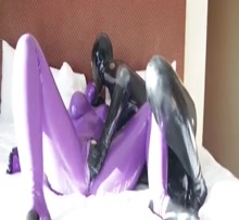 Lezdom fisting in latex