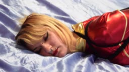 Hogtied in red spandex