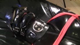 Rubber Mistress delivers a blowjob