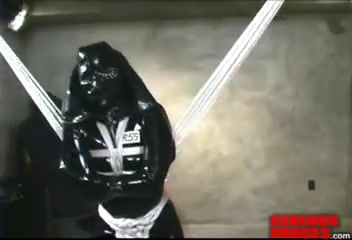 Rubber GIMP in straitjacket
