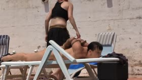 Sun tanning by the pool