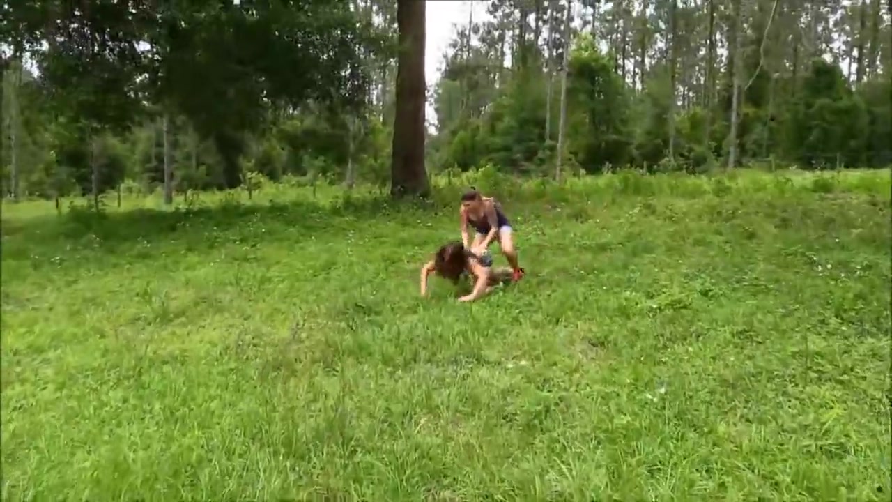 Hogtied with a tape outdoors