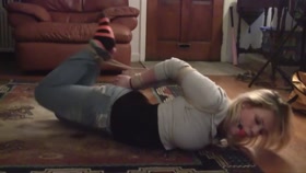 hogtied and ball gagged struggle