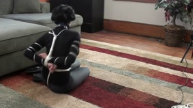 Black boots and jeans with ropes