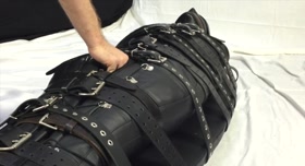 Restrained with 20 belts in heavy leather