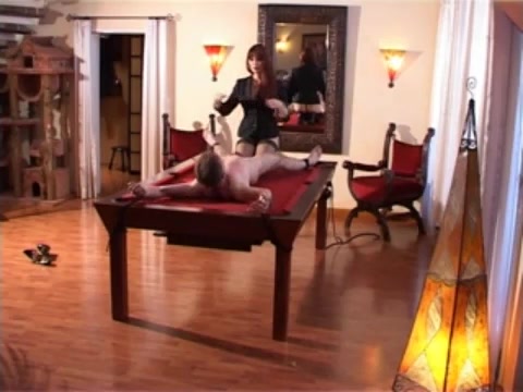 Helpless male slave on the pool table