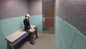Straitjacket in a cell after arrest