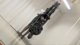 Handjob in Rubber and Suspension