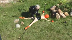 Spread Eagle in Latex Outdoors