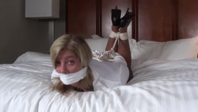 Dakkota the blonde hogtied on bed