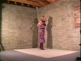 Blonde in Devonshire Bondage