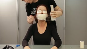 Gagged, Taped and Hooded