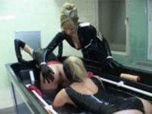 Kinky Lesbian Domme uses two slavegirls in Water pool