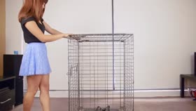 Closing Herself Into Cage