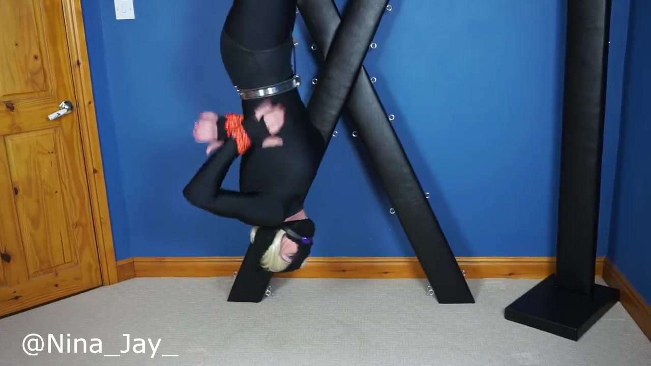 Nina Jay Mummifed and Suspended Inverted in Chastity