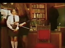 Lesbian Brunette getting caned hard