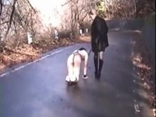 Taking her slave for a walk