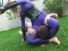 Hot Blonde in Purple Spandex humiliating a man