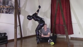 Burglar in Latex Gets Tied Up