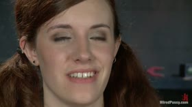 18 Year Old Iona has her First Experience with a Girl on Camera with Two Doms