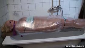 wrapped in plastic and gagged