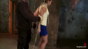 Sexy Amber has her elbows bound together, ankles to neck, and endures foot caning, brutal orgasms.